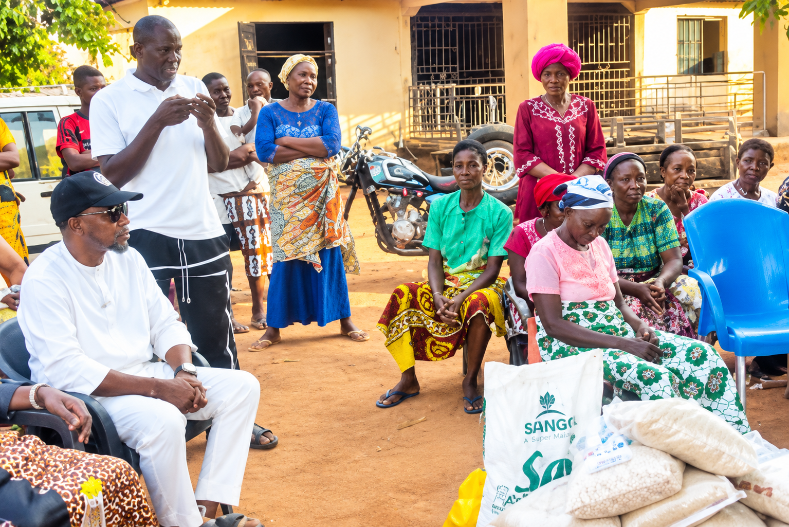 Community members gathered during a food relief support activity