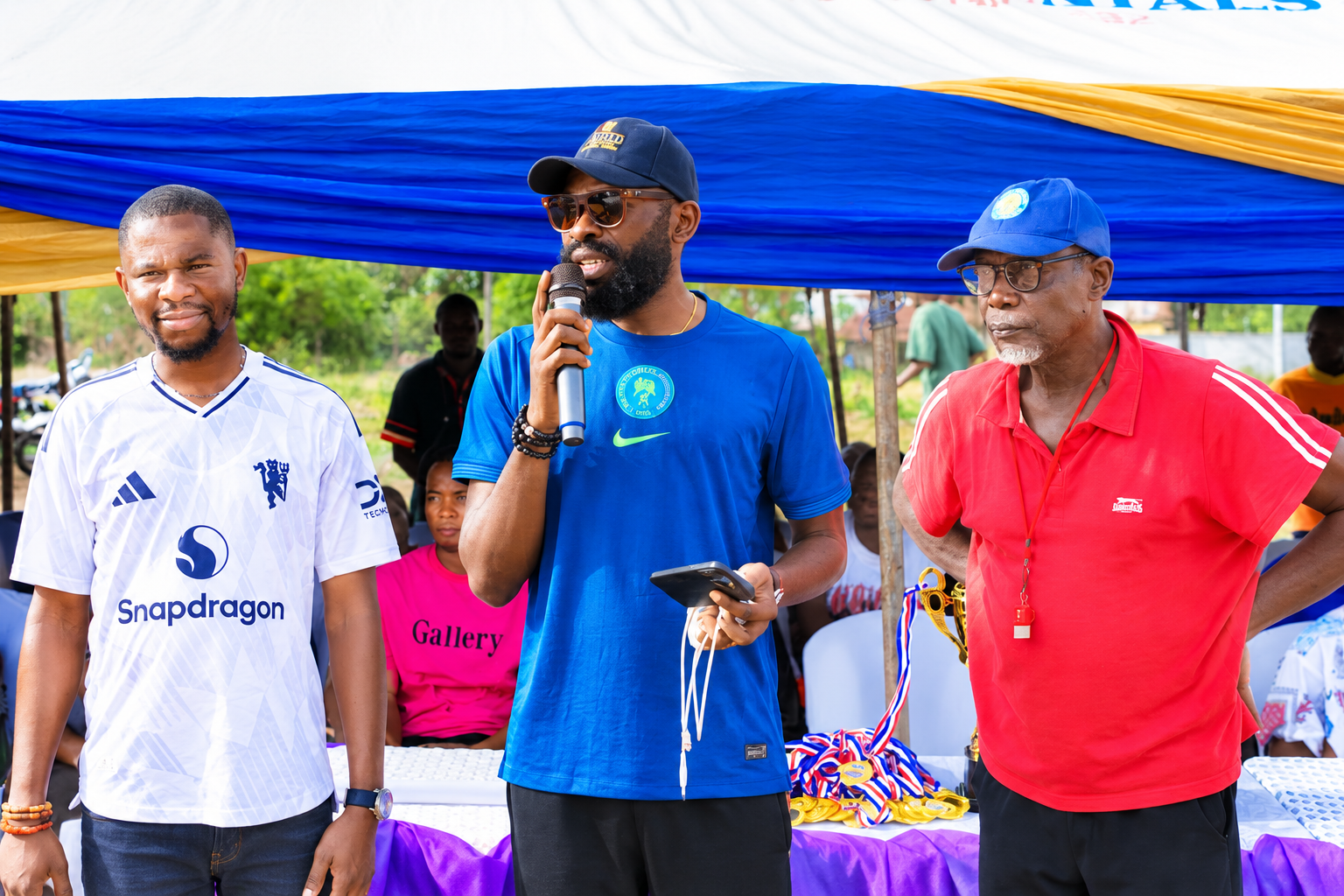 Foundation representatives and participants at a sporting development event