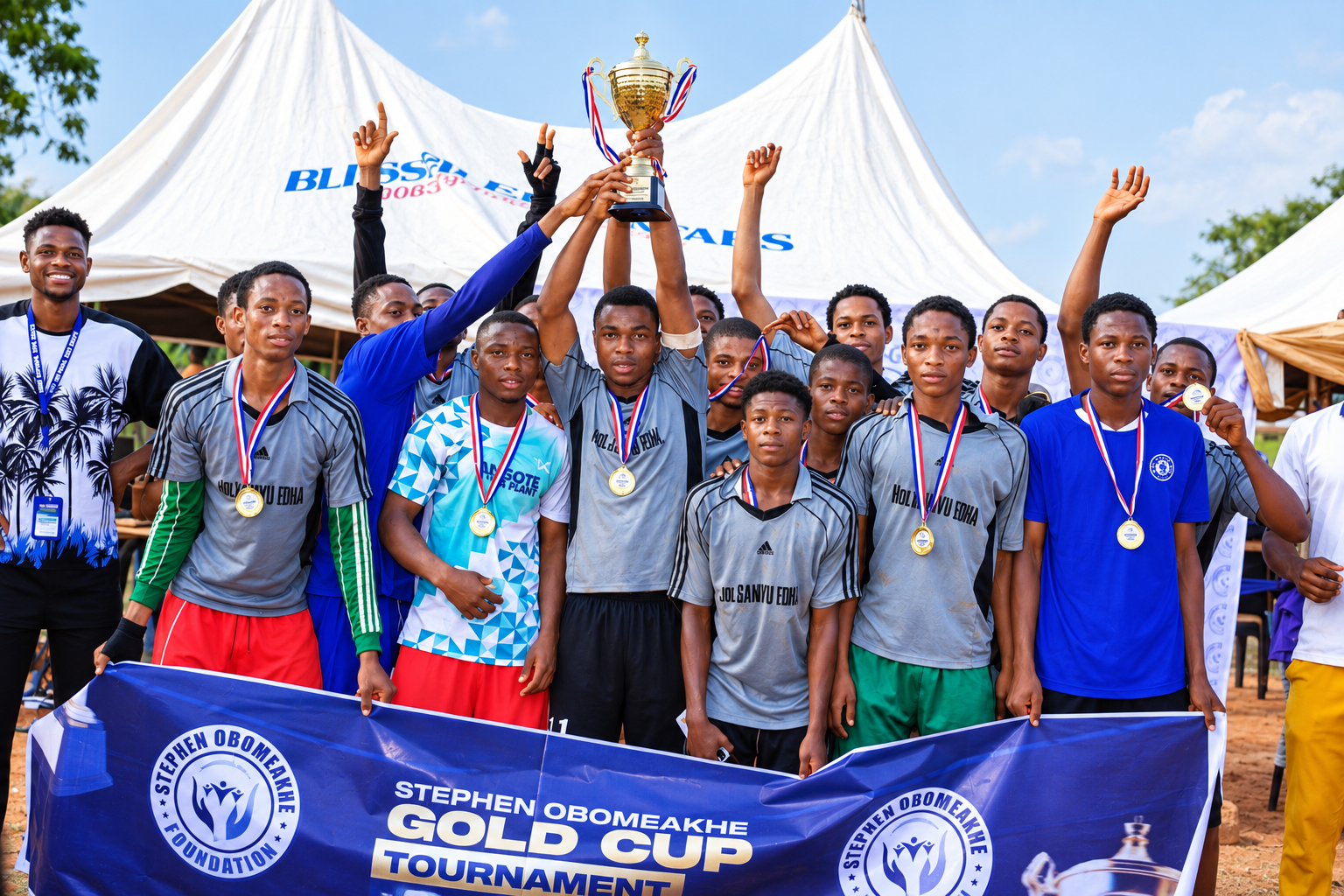 Young football players celebrating after a foundation-supported tournament